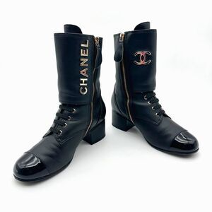 CHANEL Black Leather Lace Up Combat Boots Size 37 CC Logo Booties Cap Toe